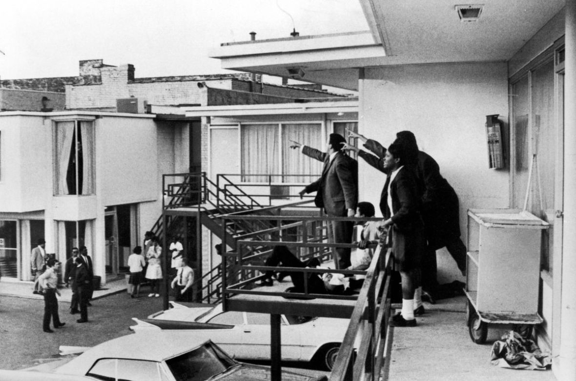 Civil rights ldr. Andrew Young (L) and others stan