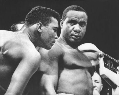 cassius-clay-sonny-liston-stare-weigh-in